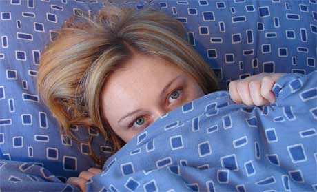 mujer en la cama